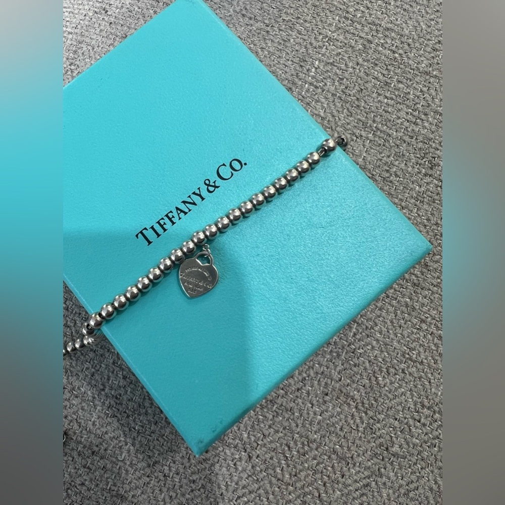 Tiffany & Co beaded bracelet with heart charm